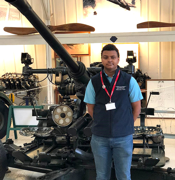 Young SVAS volunteer with Bofors Gun at an education event